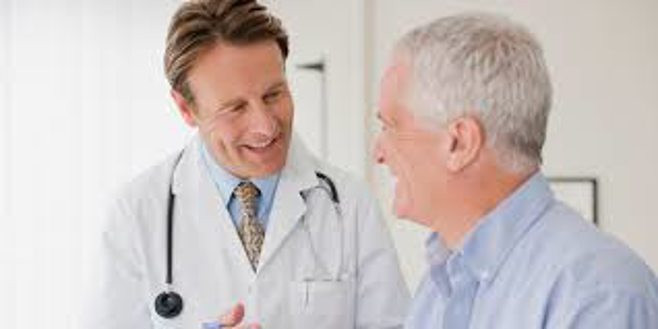 Doctor and patient smiling 